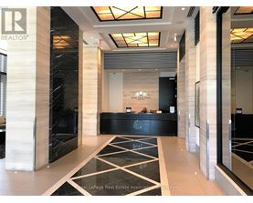 A reception area with a black and white checkered floor.