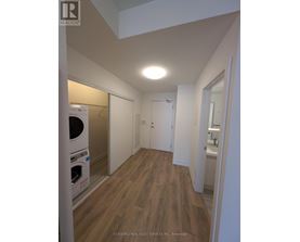 A laundry room with a washer and dryer.