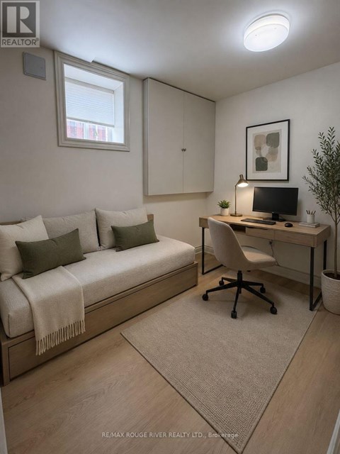A cozy bedroom with a bed, desk, and chair.
