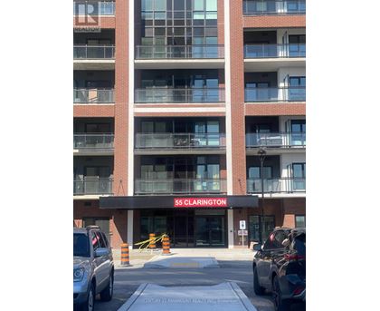 A building with the sign 55 Clarington in front of it.
