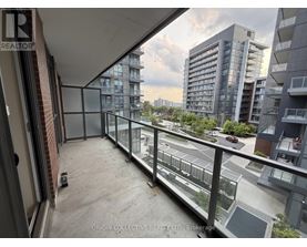 Origin Collective Realty Ltd. Brokerage is the name of the company advertised on the image.