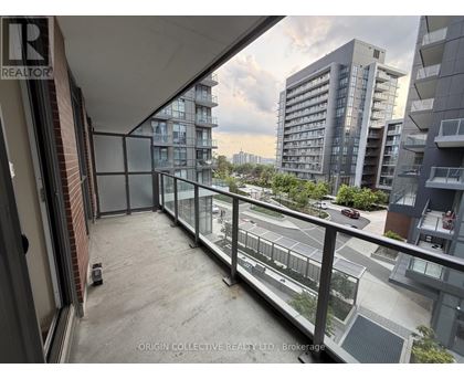 Origin Collective Realty Ltd. Brokerage is the name of the company advertised on the image.
