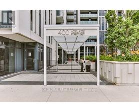 The entrance to a building with the sign 400 Adelaide Street East.
