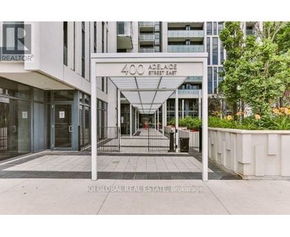 The entrance to a building with the sign 400 Adelaide Street East.