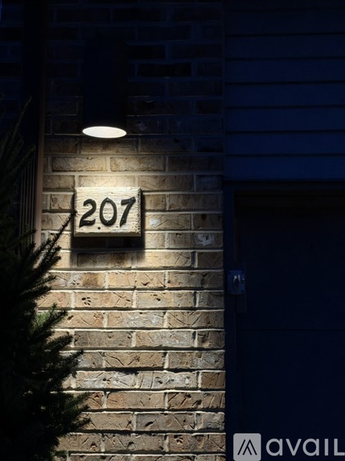 A wall with a number 207 on it.