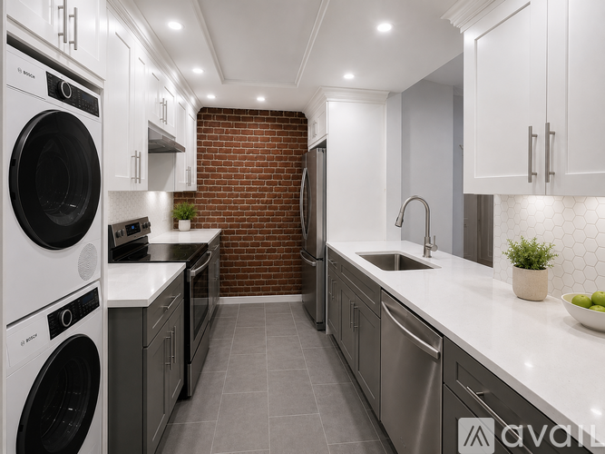 A modern kitchen with a washing machine and a refrigerator.