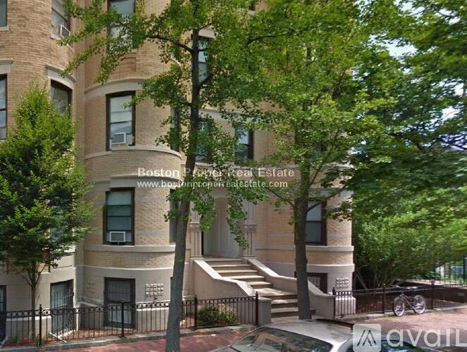 A building with the text "Boston Free Estate" on it.