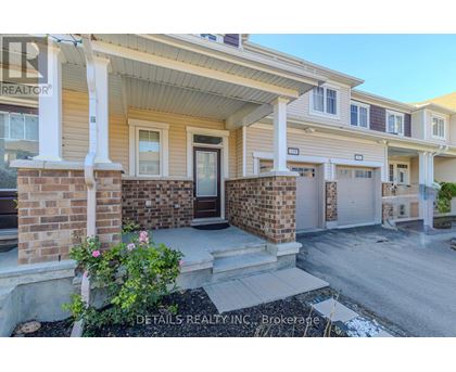 A house with a front porch and a sign that says "REALTOR".