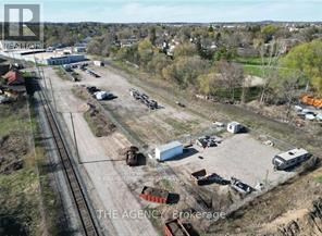 A construction site with a train track running through it.
