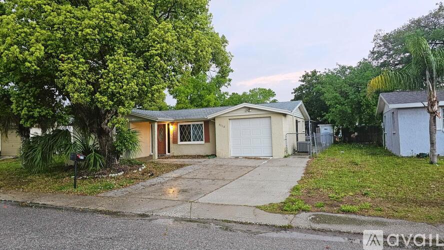 A house with a garage is available for rent.
