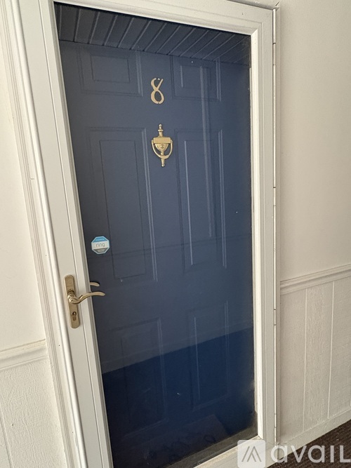 A door with a number 8 sticker on it.