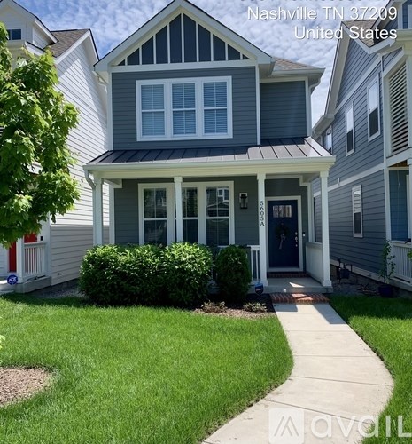 A house in Nashville, TN with the number 37209 written on it.