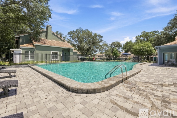 A house with a pool in the backyard.