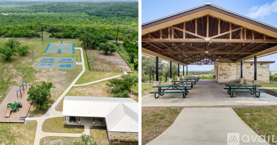 A park with a playground and a pavilion.