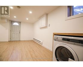 A laundry room with a washing machine and dryer.