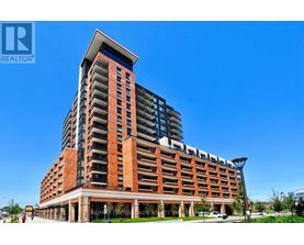 A tall building with a sign that says RE/MAX CROSSROADS REALTY INC.