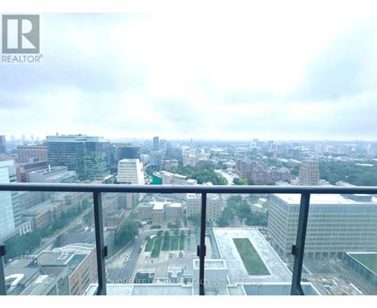 A cityscape viewed from a high-rise building.