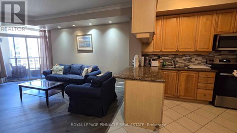 A living room with a couch and a coffee table.
