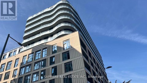 A tall building with a sign that says Sapphire Real Estate Inc. Brokerage.