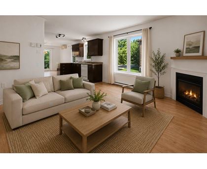 A living room with a fireplace and a couch.