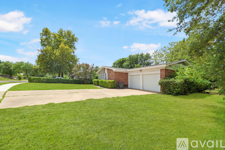 A house with a garage is available for sale.