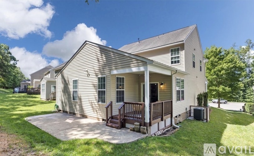 A house with a porch and a covered entrance.