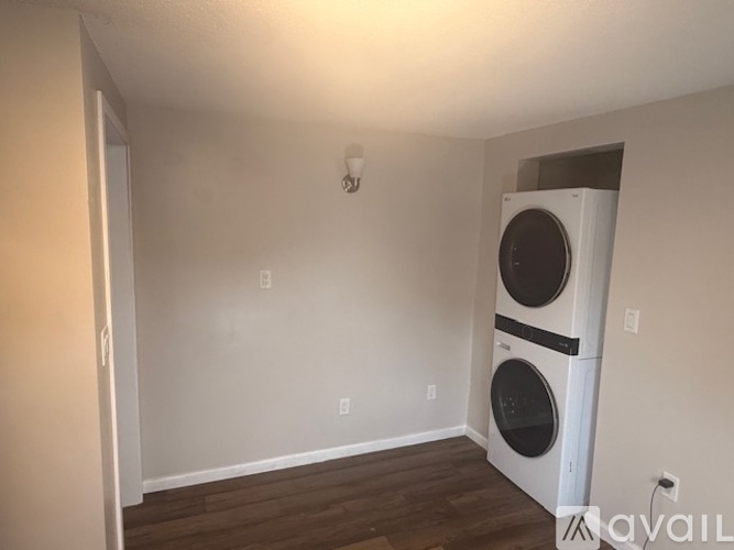 A laundry room with a washer and dryer.