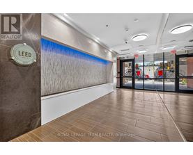 A hallway with a LEED logo on the wall.