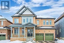 A large house with a garage is for sale.