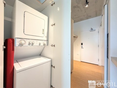 A white oven and dishwasher in a small kitchen.