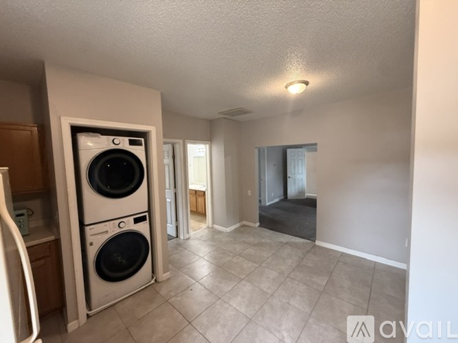 A laundry room with a washer and dryer.