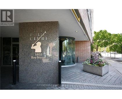 The front of a building with a sign that says "The Polo Club" on it.