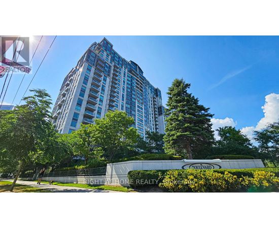 A tall building with a sign that says "Courtyard" on it.