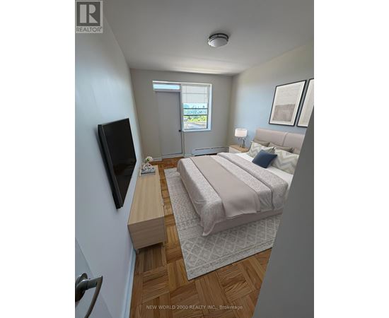 A bedroom with a bed, a television, and a window.