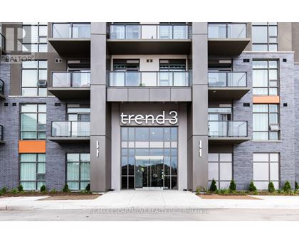 A modern building with the name "trend 3" on the front.