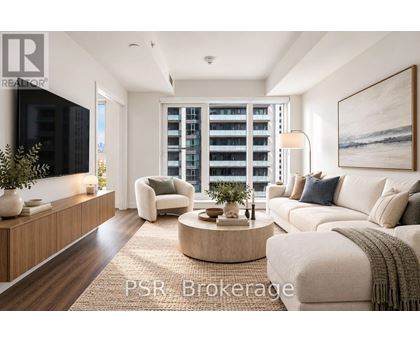 A modern living room with a large window, a white sofa, and a wooden floor.