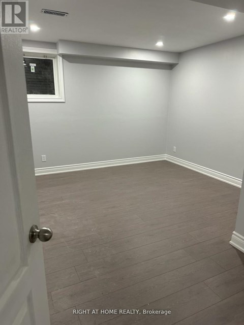 A room with a door and a window.