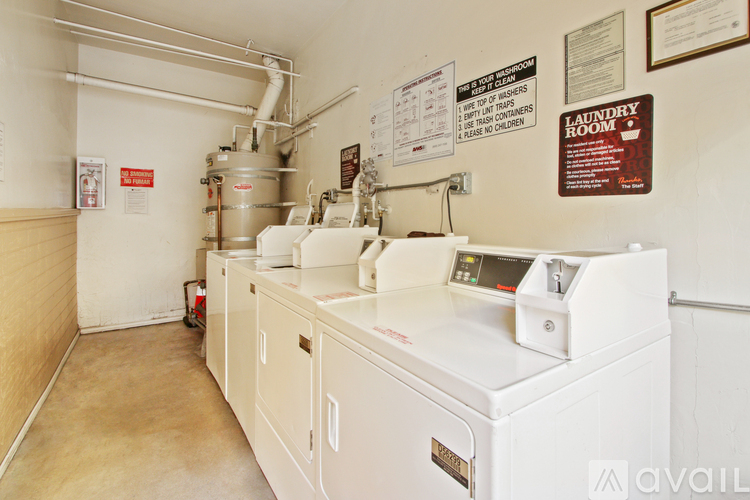 A laundry room with a washer and dryer.