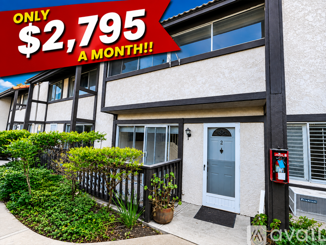 A house with a red sign that says "ONLY $2,795 A MONTH!".