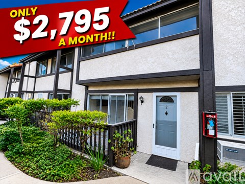 A house with a red sign that says "ONLY $2,795 A MONTH!".