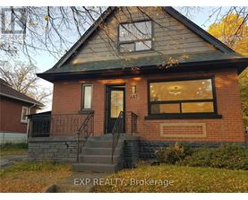 A house with the number 467 on the front window.