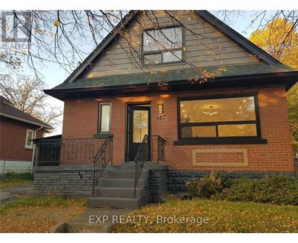 A house with the number 467 on the front window.
