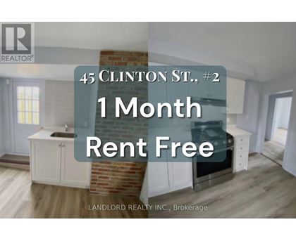 A real estate advertisement for a property at 45 Clinton St. offering a 1 month rent-free period.