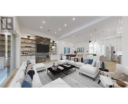 A modern living room with a white sofa set and a black coffee table.