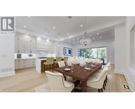 A modern dining room with a wooden table and chairs.