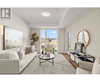 A well-lit living room with a large window and a view of the outside.