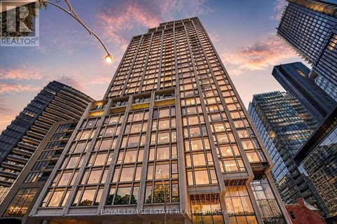 A tall building with the words "Royal LePage Estates" on the front.