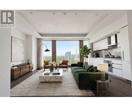 A modern living room with a view of the city.