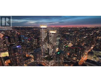 A cityscape at dusk with a prominent skyscraper in the center.