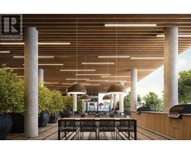 A modern outdoor seating area with a wooden ceiling and pillars.